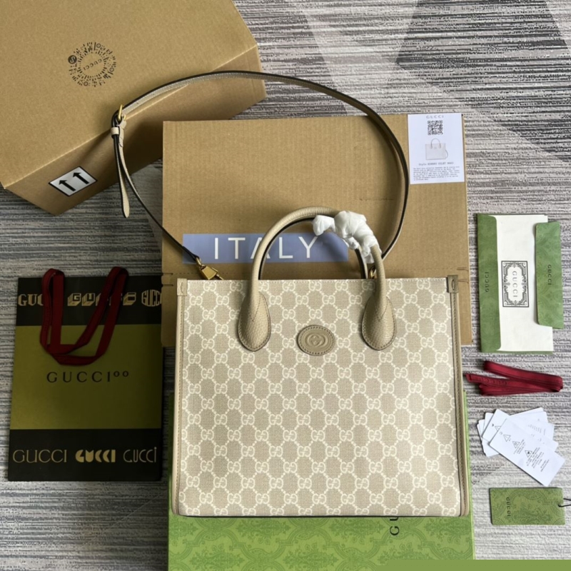 G*u*i shopping bags